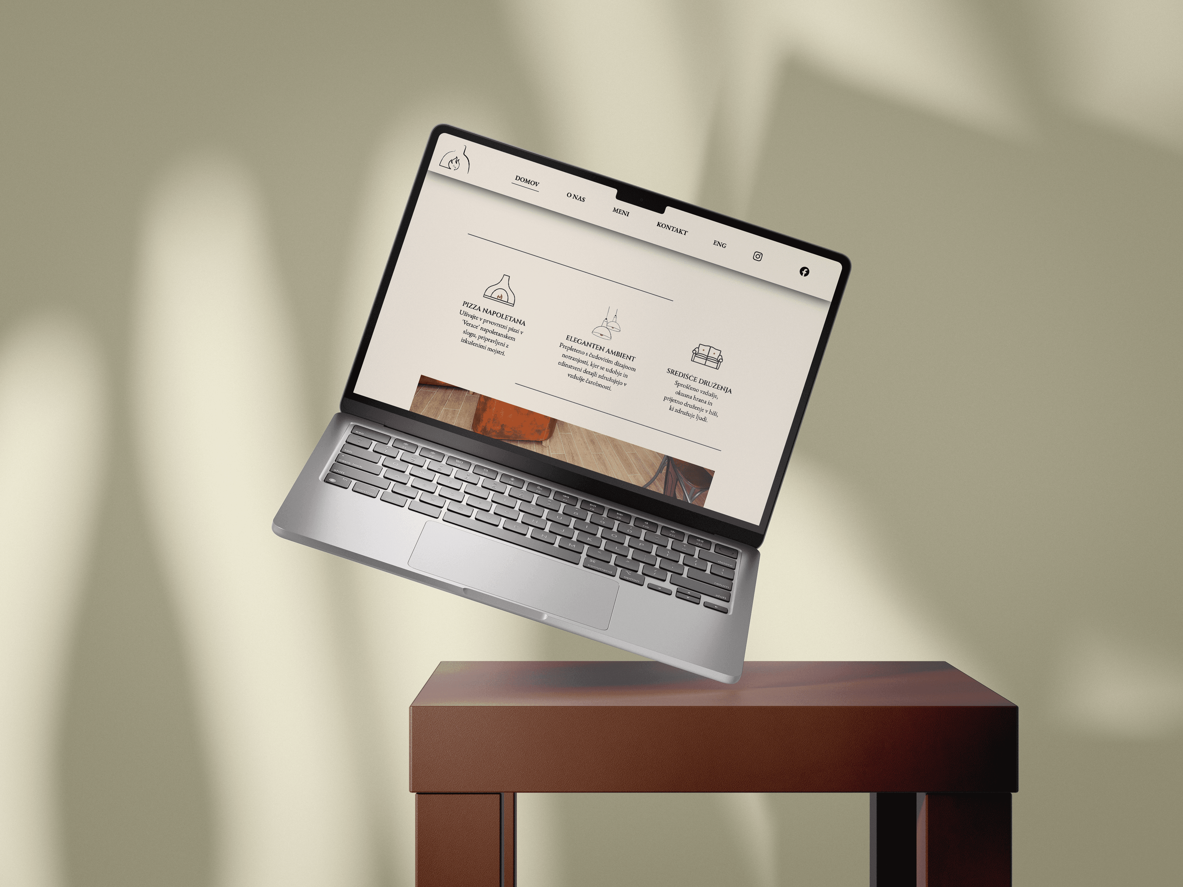 Restaurant website mockup on a MacBook showing contact page